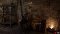 You can use the key that you found in the building outside to unlock the chest.