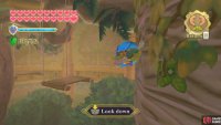 Before jumping to the next rope, use your Hook Beetle to grab a Bomb from one of the rotating columns.