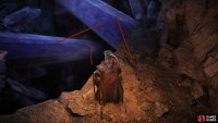 When you reach the large crystals. Use them to get down to the bottom.