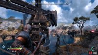 Hit the spinning wheel to the right twice to turn the crane so you can use the hook.