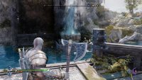 Throw your axe into the geyser to lower the lift.