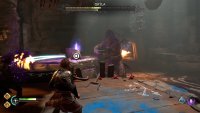 Press Square to use Angrboda to hit the purple candles and stun Gryla.