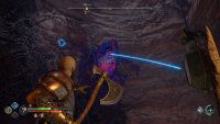 Now hit the twilight stone on the left to break the hive structure below, exposing another grapple point.