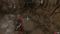 After throwing the spear, climb up to find the treasure map.