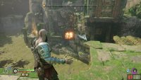 then strafe to the right and recall the Leviathan Axe, driving the recalled weapon through some more fire pots.