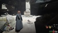 The chest is located just beneath an obelisk.