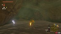 Break the rock wall in the larger opening to delve deeper