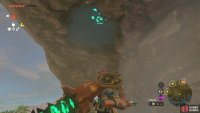 The entrance to the cave is on the ceiling of the overhang