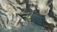 You need to paraglide into the entrance of the chasm from the cliff.