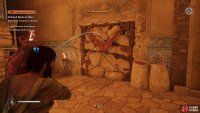 Throw the fire pot at the destructible wall to create a path for the movable barricade.
