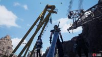 Find some yellow construction equipment and use your grappling hook to swing across to a rocky ledge,