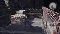 After climbing some ladders, look for the Auto-Cast Materia on some crates.