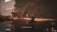 Whenever you see him grab a boulder, roll toward him as he leaps at you.