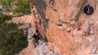 Then go around the side of the cliff to your left.