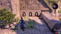 Loot east of a closed gate to find some statues in alcoves, hinting at the solution to a nearby puzzle.