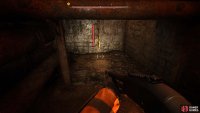 Turn left, crouch under the pipes, and climb the ladder.