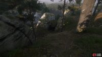 Follow a trail east of the woodcutter&rsquo;s clearing to find a boulder wedged between two rocks,