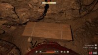 Open the chest against the northern wall.